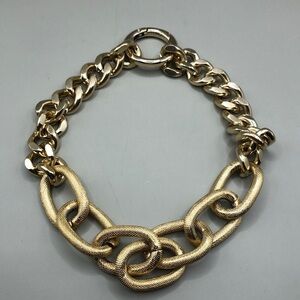 Gold tone chunky chain link utility runway style collar necklace statemenent.
